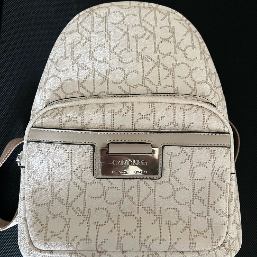 Calvin Klein Cream Backpack with Monogram Pattern